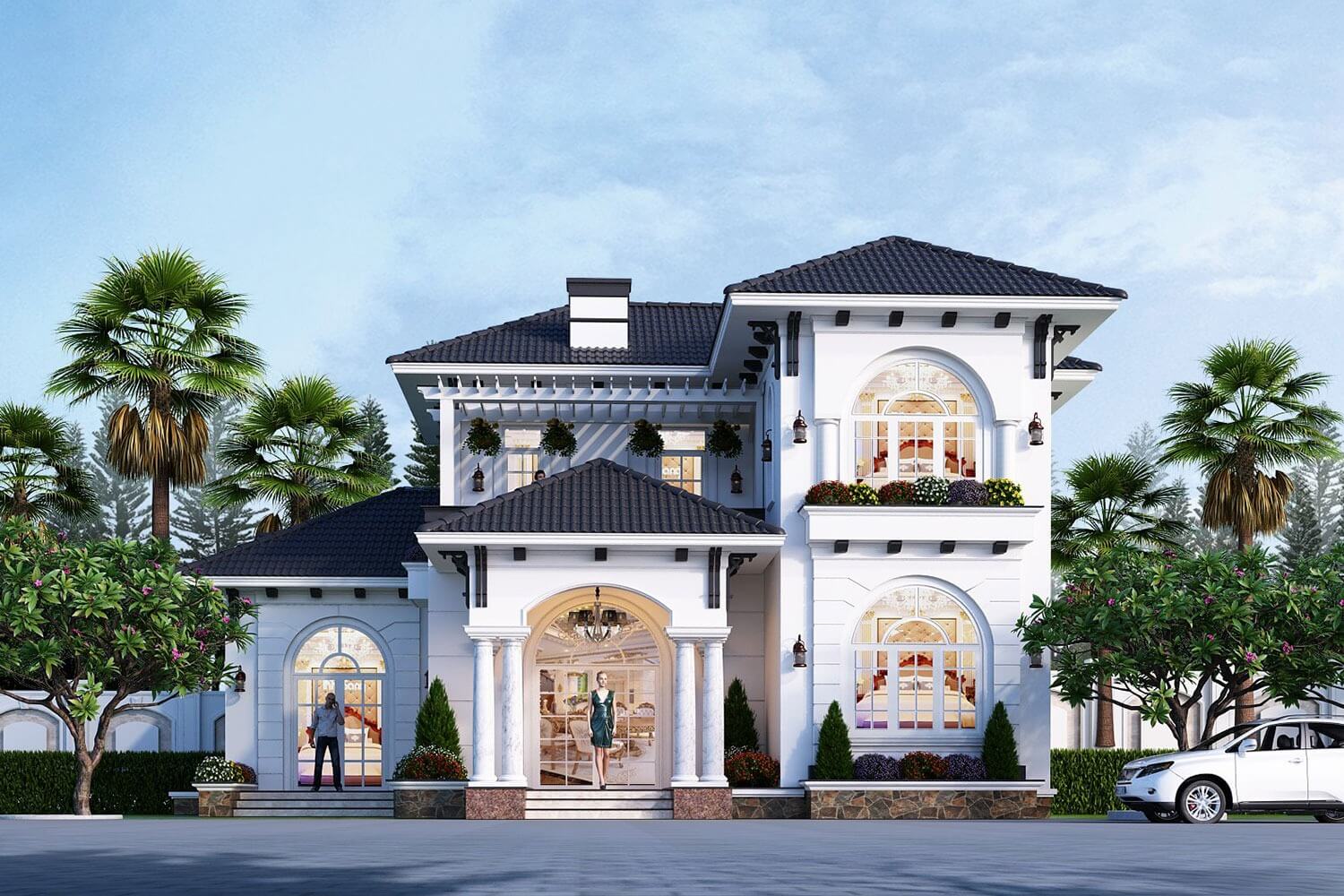 Biệt thự mini 2 tầng phong cách Địa Trung Hải có lối đi trải sỏi rộng dẫn vào ngôi nhà và chỗ đậu xe có mái che