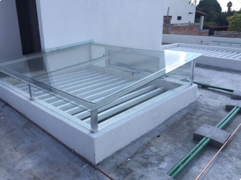 Làm mái che giếng trời bằng kính