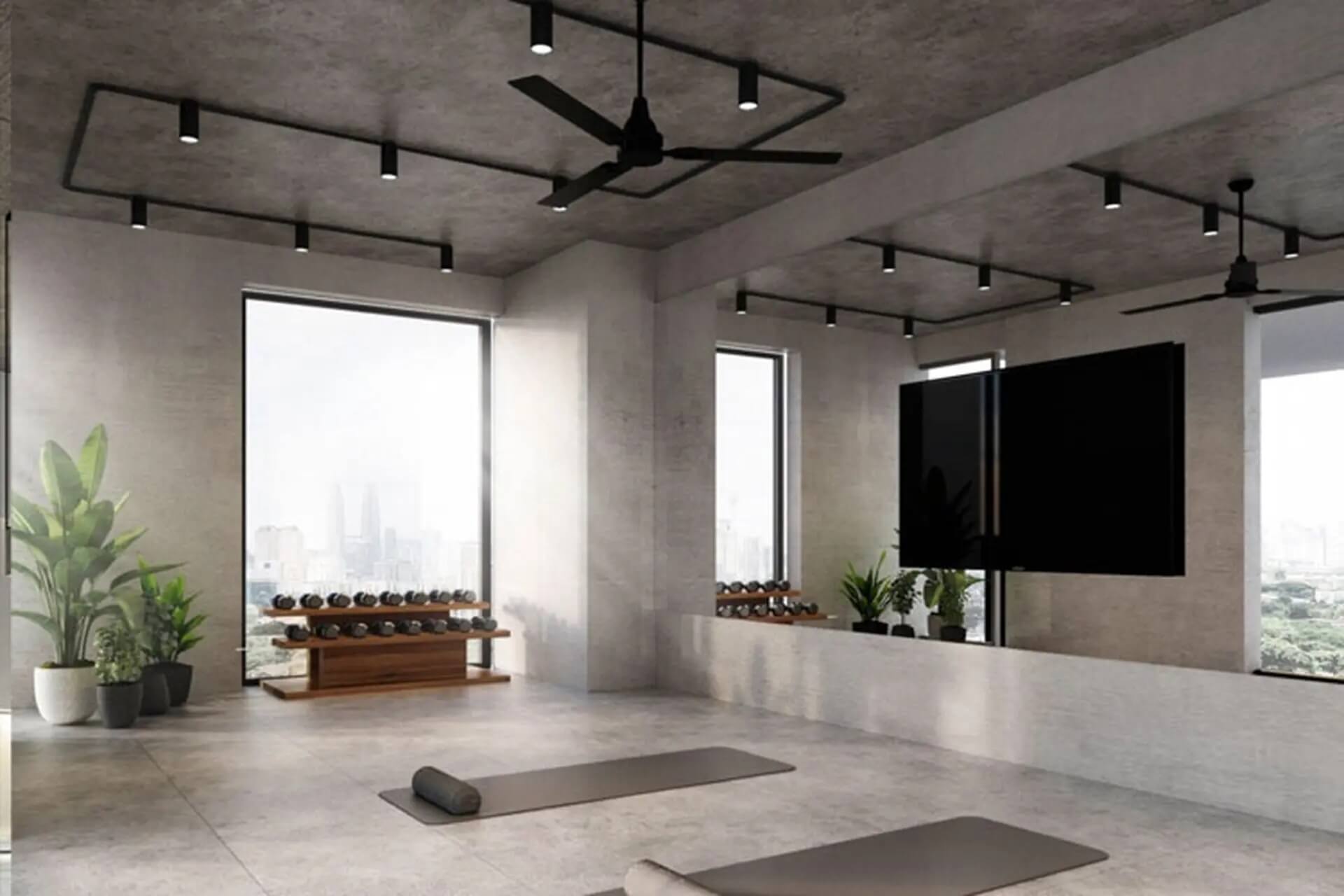 Phòng tập yoga hiện đại với thảm và tạ đôi cạnh cửa sổ lớn, cây xanh trang trí.