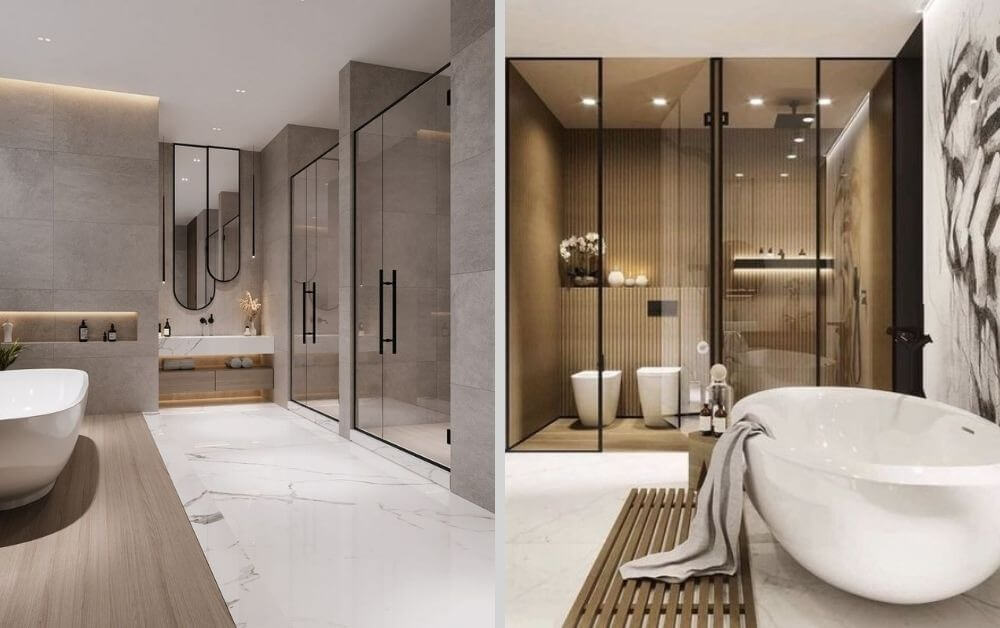 Phòng tắm hiện đại với bồn tắm lớn, vách ngăn kính, và ánh sáng đèn LED tạo không gian sang trọng.