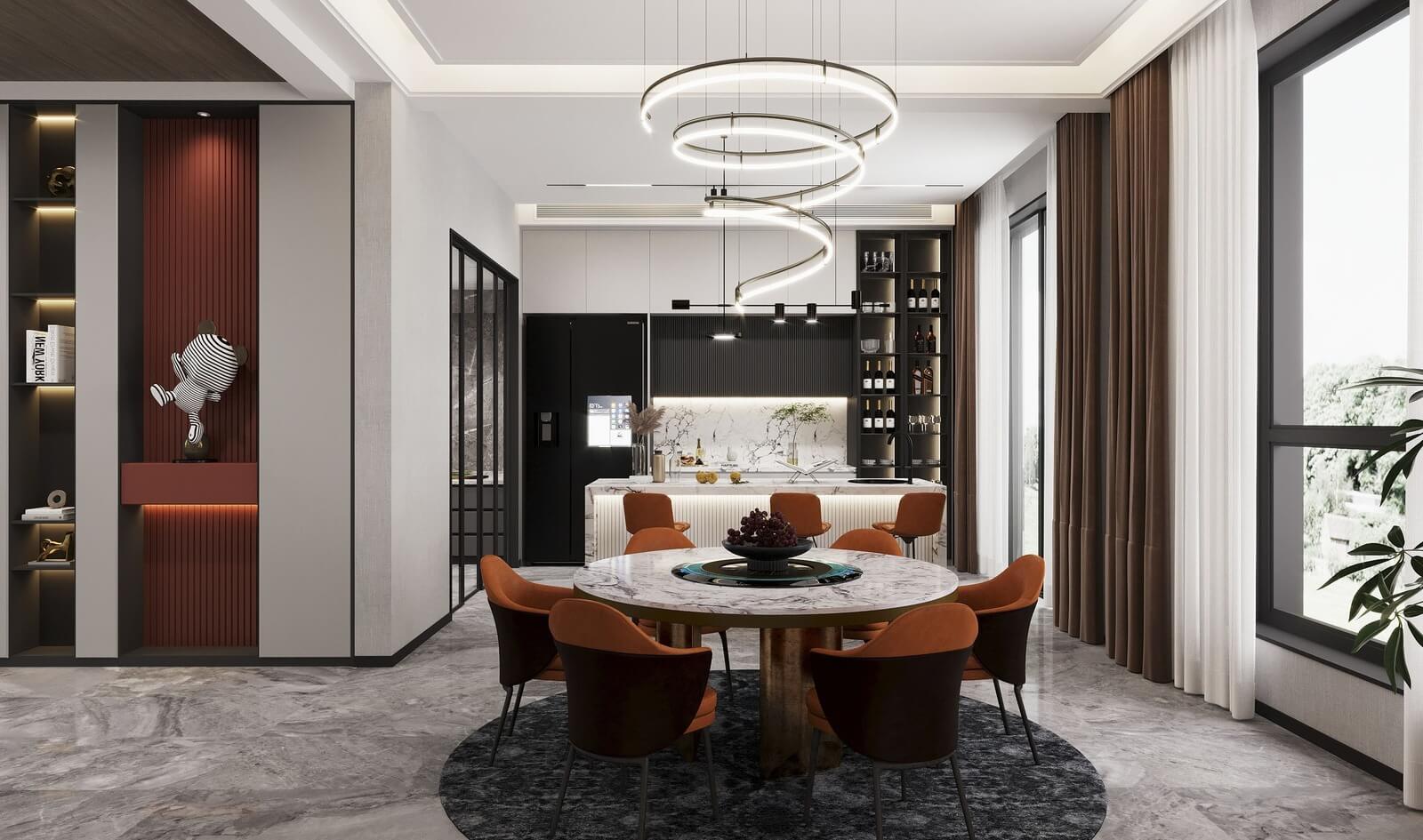 Phòng bếp hiện đại với bàn ăn tròn, ghế màu cam, đèn treo nghệ thuật và tủ rượu tinh tế.