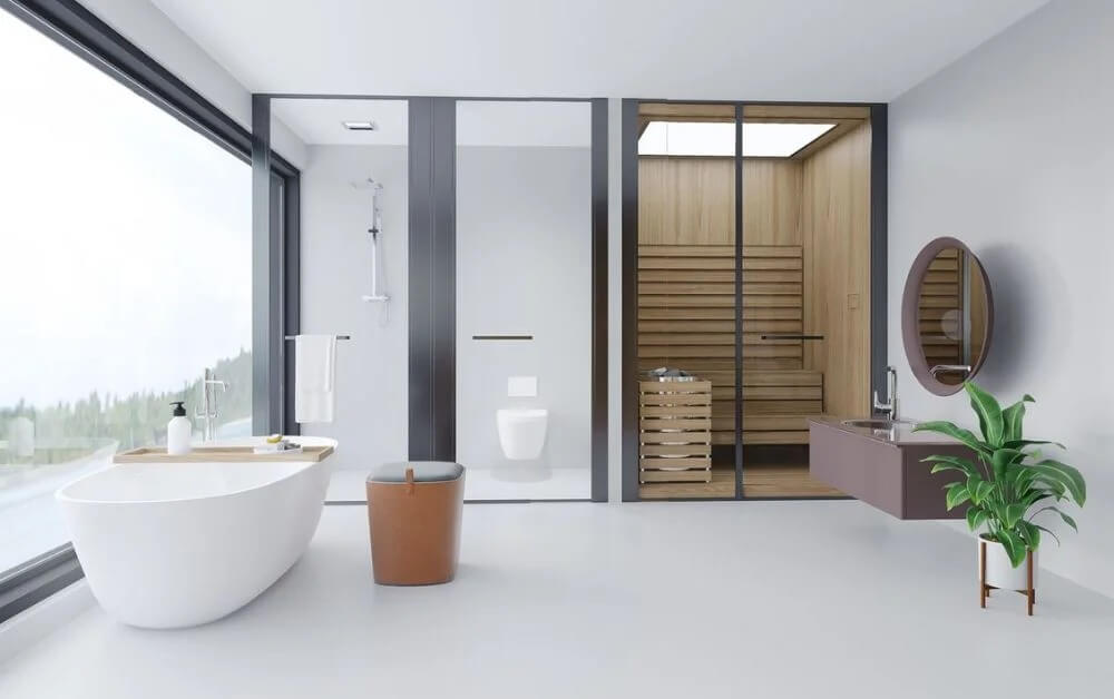 Phòng tắm hiện đại với bồn tắm sang trọng, buồng tắm kính, cây xanh và ánh sáng tự nhiên.