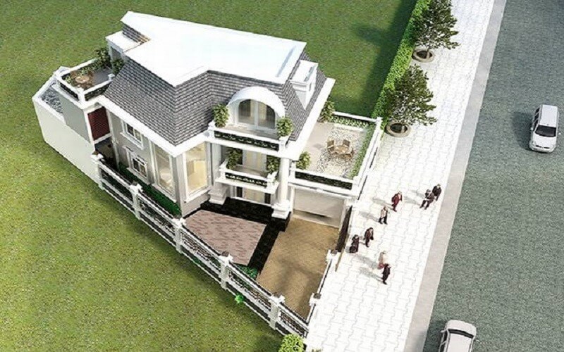 Biệt thự sang trọng với sân vườn xanh, tầm nhìn từ trên cao, đường phố và xe cộ hai bên.