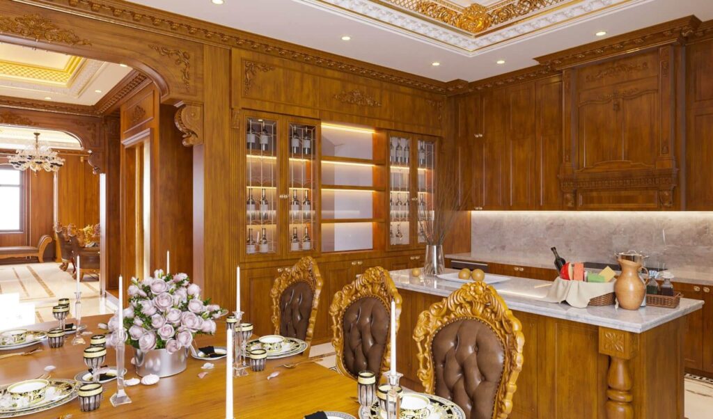 Phòng ăn sang trọng với nội thất gỗ chạm khắc, bàn ăn trang trí hoa và nến, không gian ấm cúng và đẳng cấp.