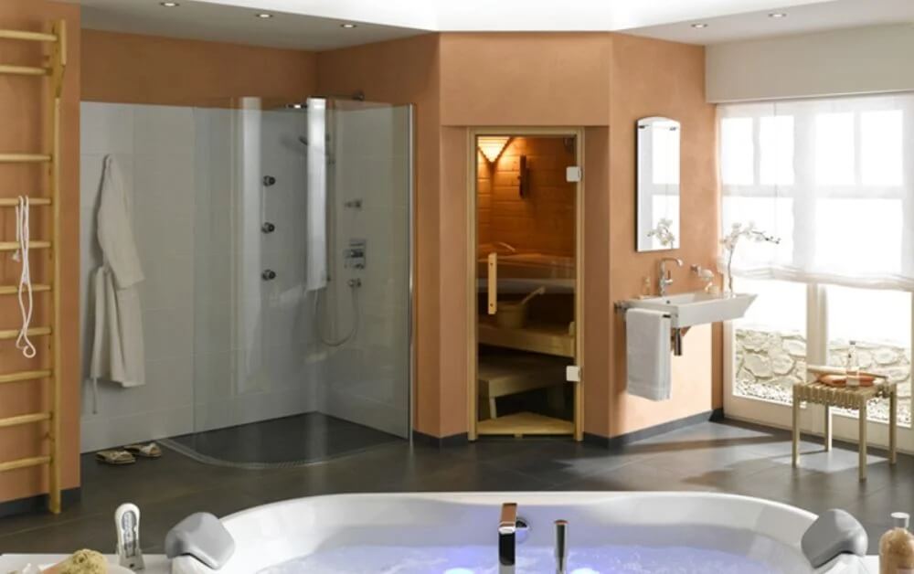 Phòng tắm spa hiện đại với bồn tắm sục, phòng tắm hơi và vòi sen, mang lại cảm giác thư giãn và thoải mái.